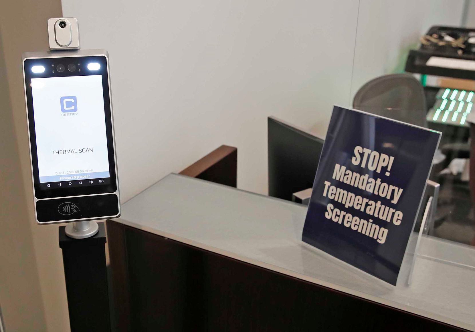 Everyone entering the Cowboys headquarters in Frisco must stand in front of this thermal scanner to have their temperature recorded. They cannot enter with a fever.