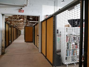 Tyler Station is divided into individual workspaces inside a warehouse in Dallas on Tuesday,...