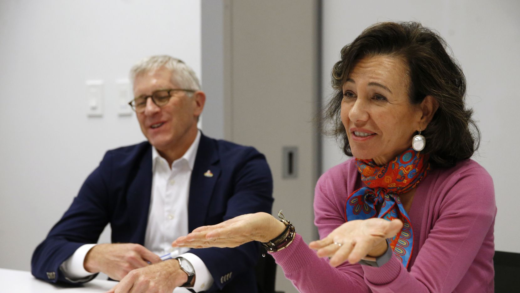 Ana Botin (right), executive chairman of Banco Santander, and Scott Powell, CEO of Santander Consumer USA, said they've improved the financial controls and standards at the subprime lender. Despite a high share of troubled loans, they're not worried about a downturn.