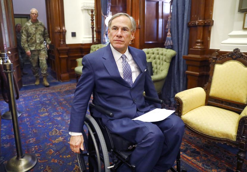 Gov. Greg Abbott, shown entering a March 29 coronavirus news briefing, faces blowback from...