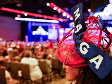Attendee Meghan Anderson wearing a MAGA designed hat watches the third day of Conservative...