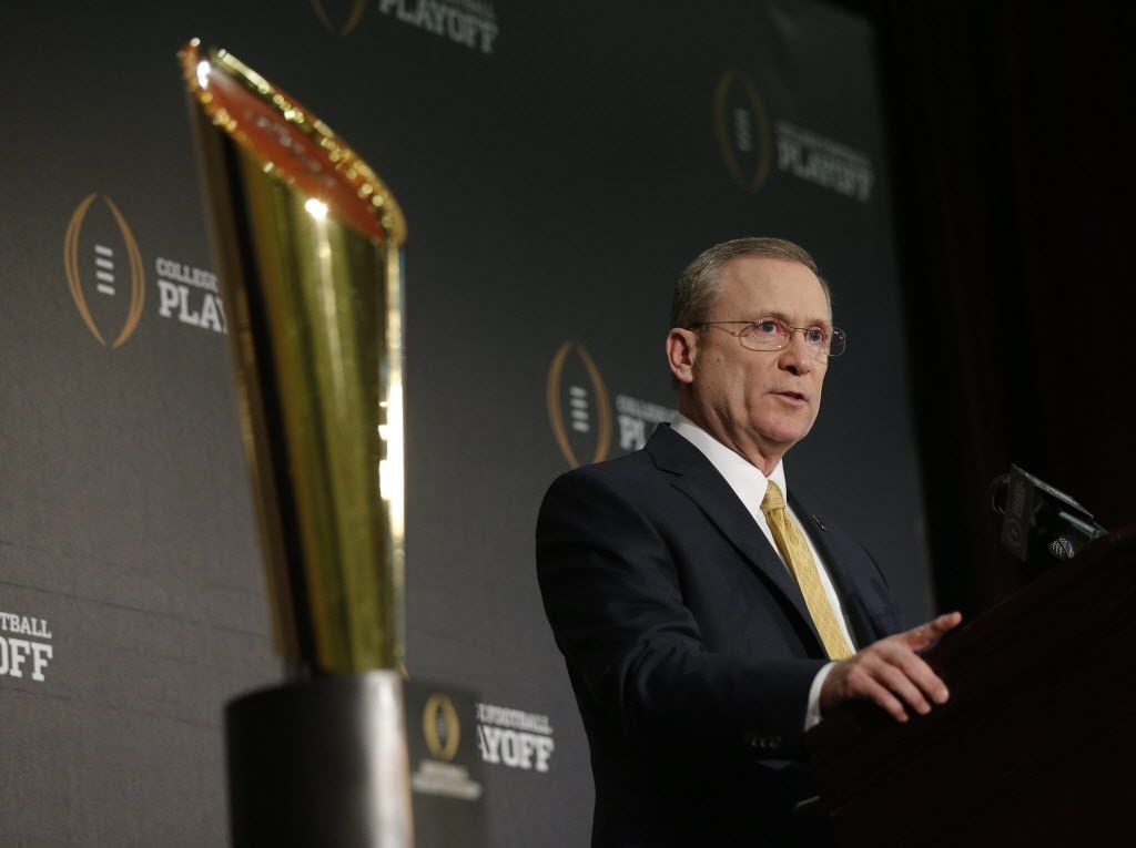 The College Football Playoff committee's Jeff Long talks to reporters about the announcement for the playoff semifinal pairings and semifinal bowl assignments at the Gaylord Texan Resort & Convention Center in Grapevine, Tx on Dec. 7, 2014. Nathan Hunsinger/The Dallas Morning News)