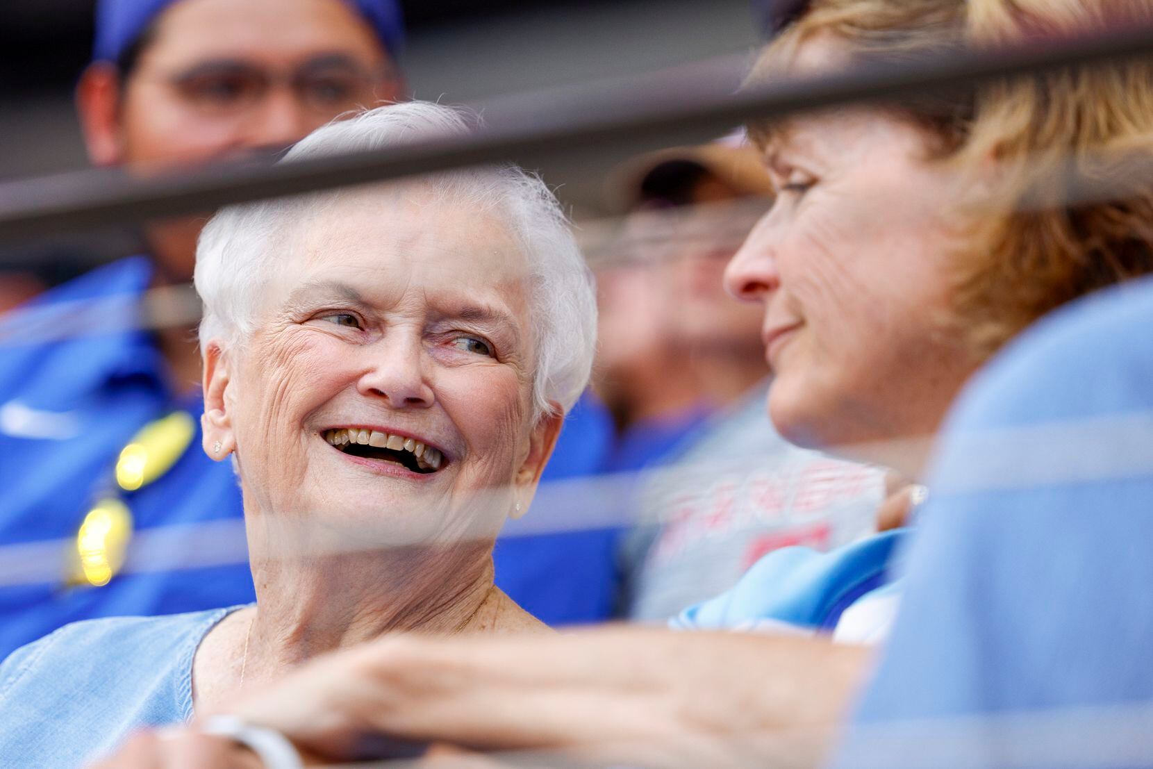 Nancy Wangner (left) chats with her daughter Jeannie Richards during the Texas Rangers’ home...