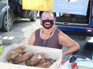 How about that kisser on Dana Shasken, who owns Mockingbird Food Co. She's one of many vendors finding ways to lighten the mood during COVID times at Cowtown Farmers Market in Fort Worth.