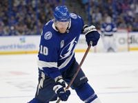 Tampa Bay Lightning right wing Corey Perry shoots during the third period of Game 4 of the...