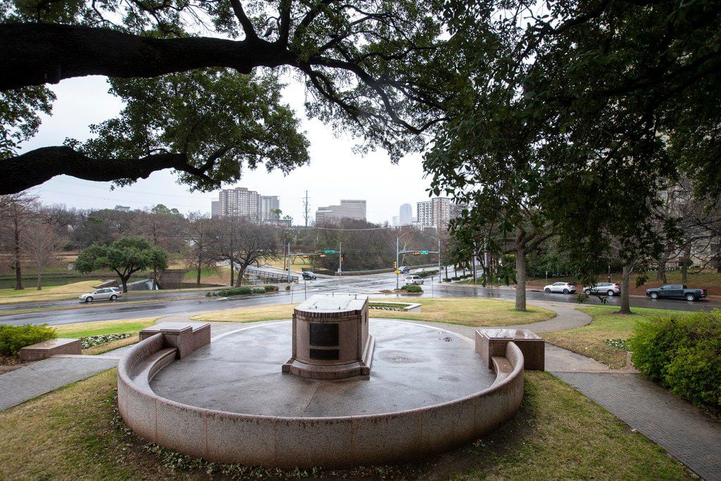 The plinth where a statue of Robert E. Lee stands empty at Oak Lawn park in Dallas on...