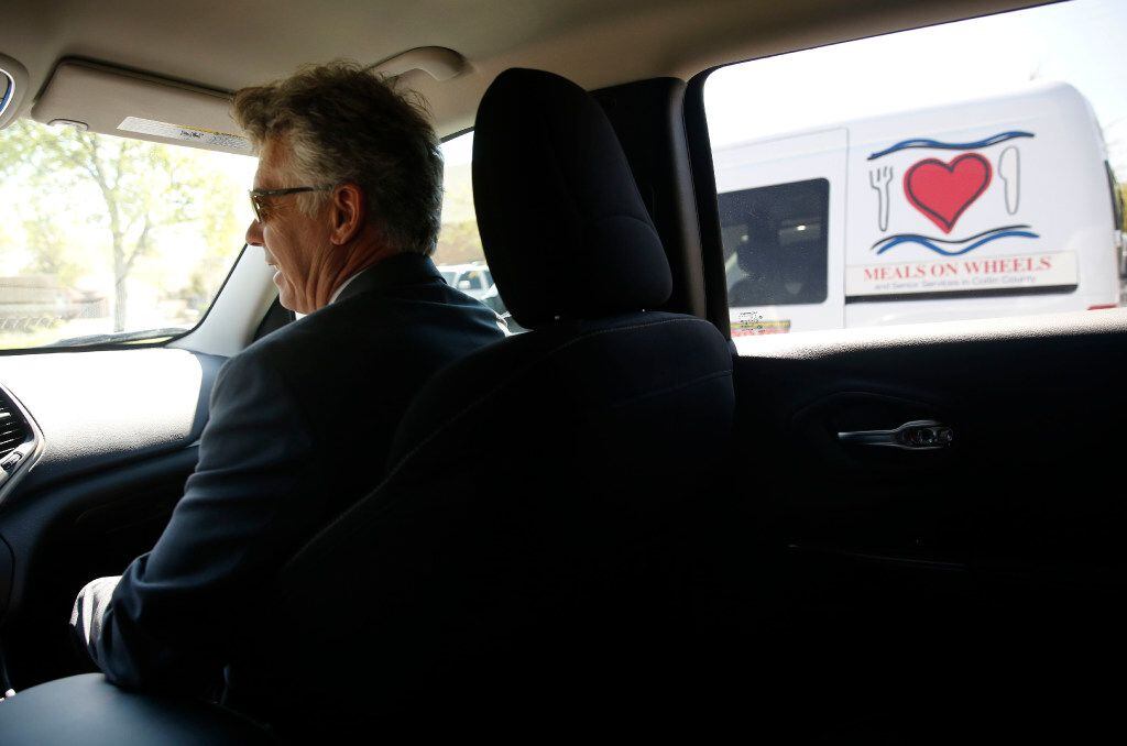 McKinney Mayor Brian Loughmiller makes a Meals on Wheels delivery to a home in McKinney on...