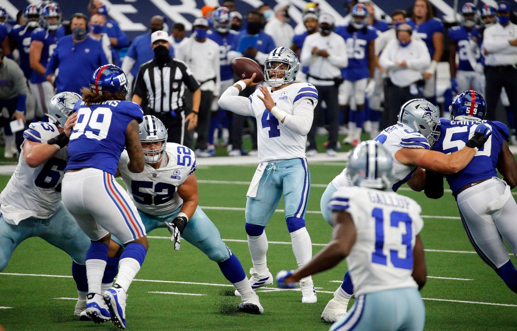 Dallas Cowboys quarterback Dak Prescott (4) throws a pass towards the end zone during the first quarter against the New York Giants at AT&T Stadium Stadium in Arlington, Texas, Sunday, October 11, 2020. (Tom Fox/The Dallas Morning News)
