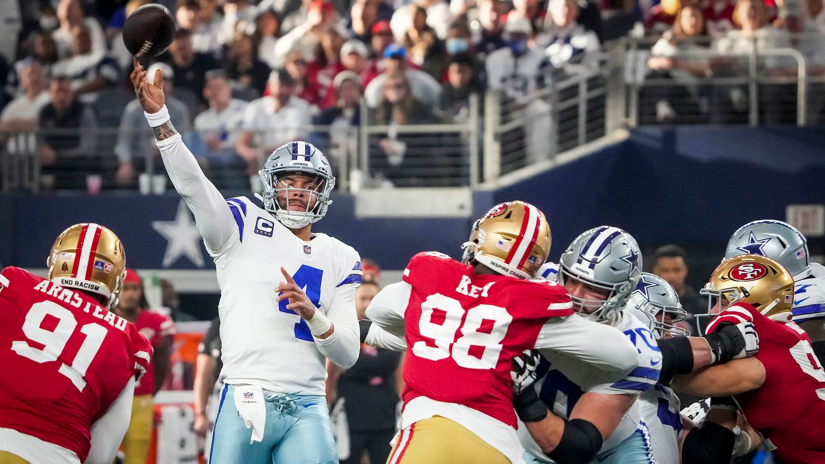 Dallas Cowboys quarterback Dak Prescott (4) throws a touchdown pass to wide receiver Amari...