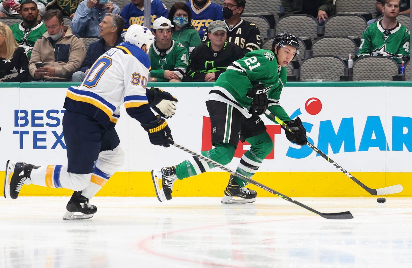 St. Louis Blues center Ryan O'Reilly (90) chases Dallas Stars left wing Jason Robertson (21) during the first period of a Dallas Stars preseason game against St. Louis Blues on Tuesday, Oct. 5, 2021, at American Airlines Center in Dallas. (Juan Figueroa/The Dallas Morning News)