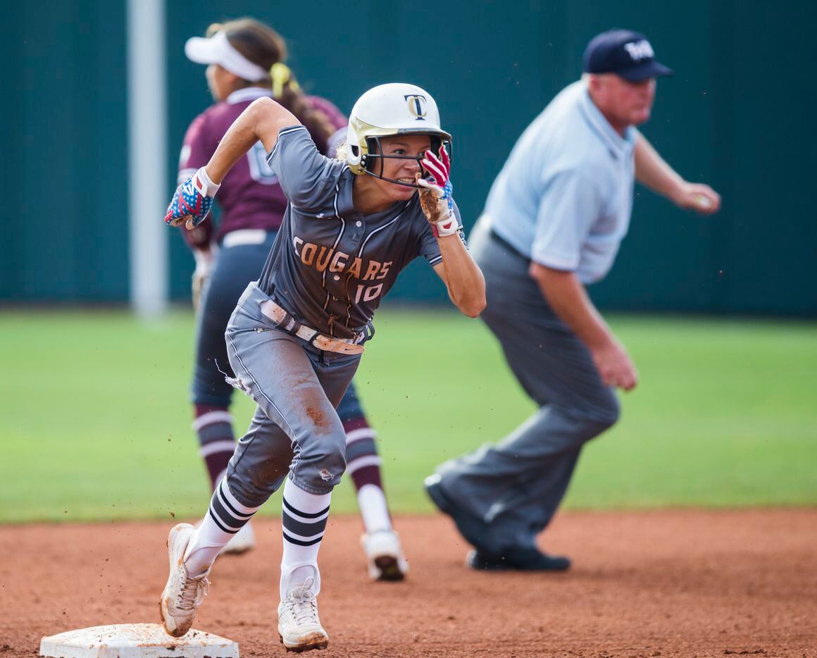 The Colony's Jayda Coleman (10) runs to third base after a dropped throw to second base by  by Calallen's Katherine Flores (6) during the first inning of a UIL Class 5A state semifinal softball game between The Colony and Corpus Christi Calallen on Friday, May 31, 2019 at Red & Charline McCombs Field at the University of Texas in Austin. (Ashley Landis/The Dallas Morning News)