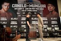 Middleweight champion Canelo Alvarez poses with his May 4 rival Jaime Munguía at a press...