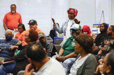 Community members express their concerns during district 4 public safety community...