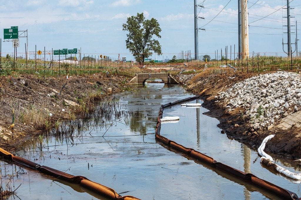 Contaminated water runs toward the Grand Calumet River and Lake Michigan, the source of...