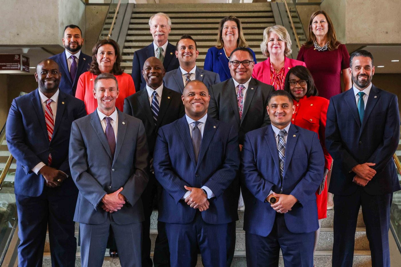 Recently elected Dallas City Council members pose together with Mayor Eric Johnson at the City Hall in Dallas on Monday, June 14, 2021, after their Inauguration ceremony. (Lola Gomez/The Dallas Morning News)