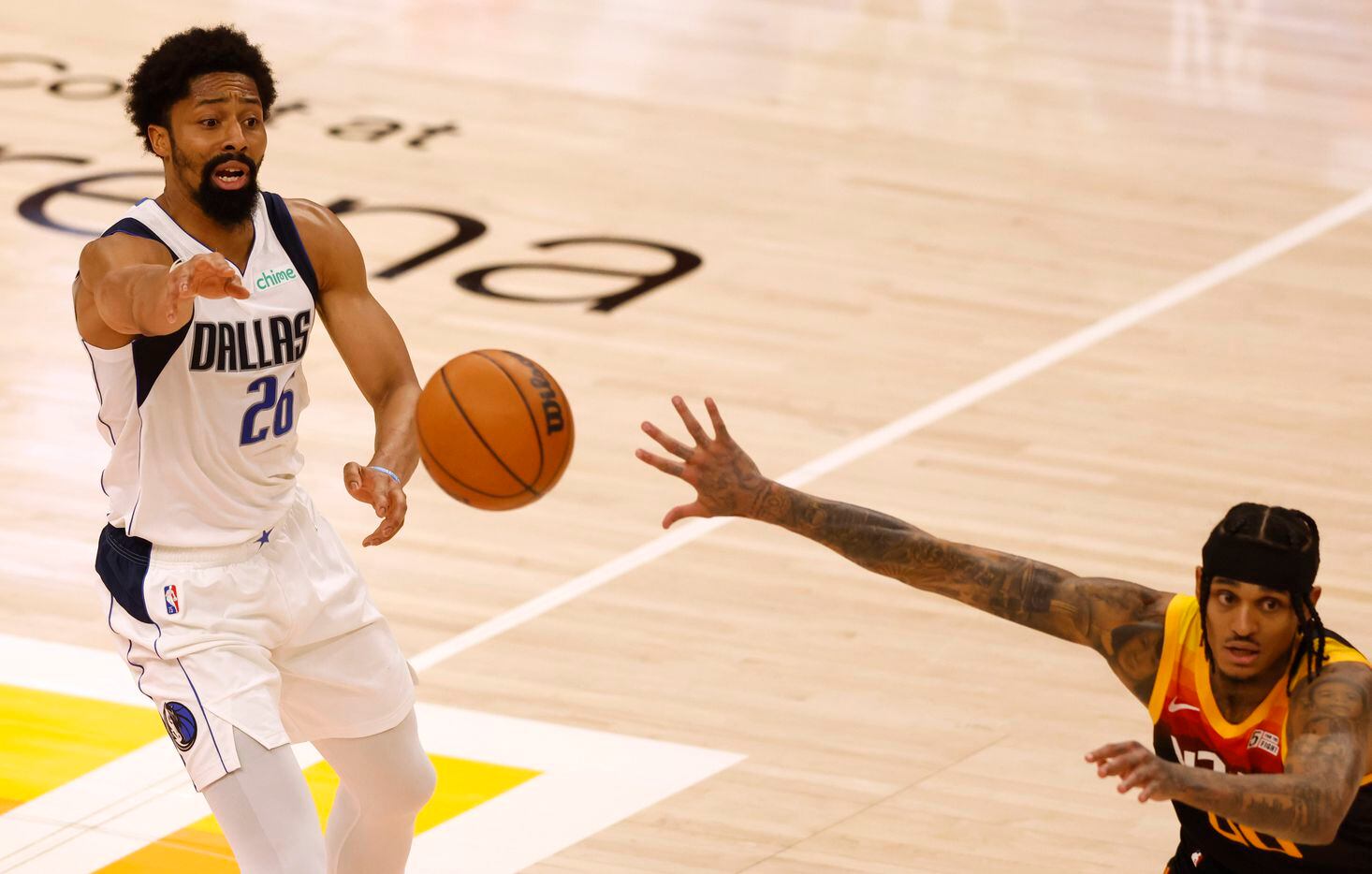 Dallas Mavericks guard Spencer Dinwiddie (26) looks to pass as Utah Jazz guard Jordan...