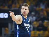 Dallas Mavericks guard Luka Doncic celebrates a basket during the first quarter in Game 2 of...