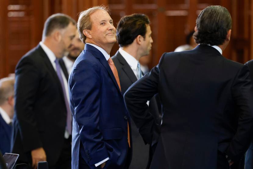 Texas Attorney General Ken Paxton looked up at the Texas Senate gallery during the first day...