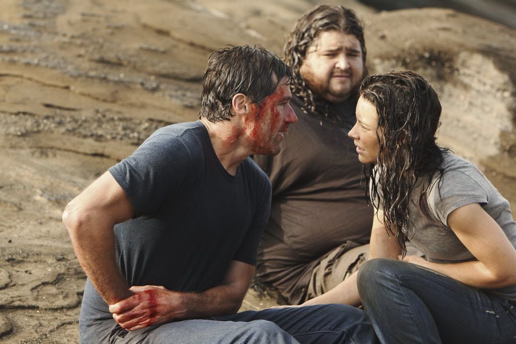 In this publicity image released by ABC, Matthew Fox, left, Jorge Garcia and Evangeline...