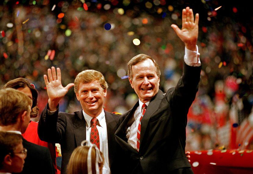 Bush and his vice presidential running mate, Sen. Dan Quayle, R-Ind., celebrated after...