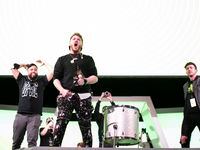 Members of the Optic Texas hype team get the crowd excited prior to the start of OpTic...