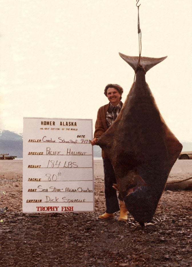 Caroline Hunt with her award-winning halibut that she caught in Homer, Alaska o,n a trip...