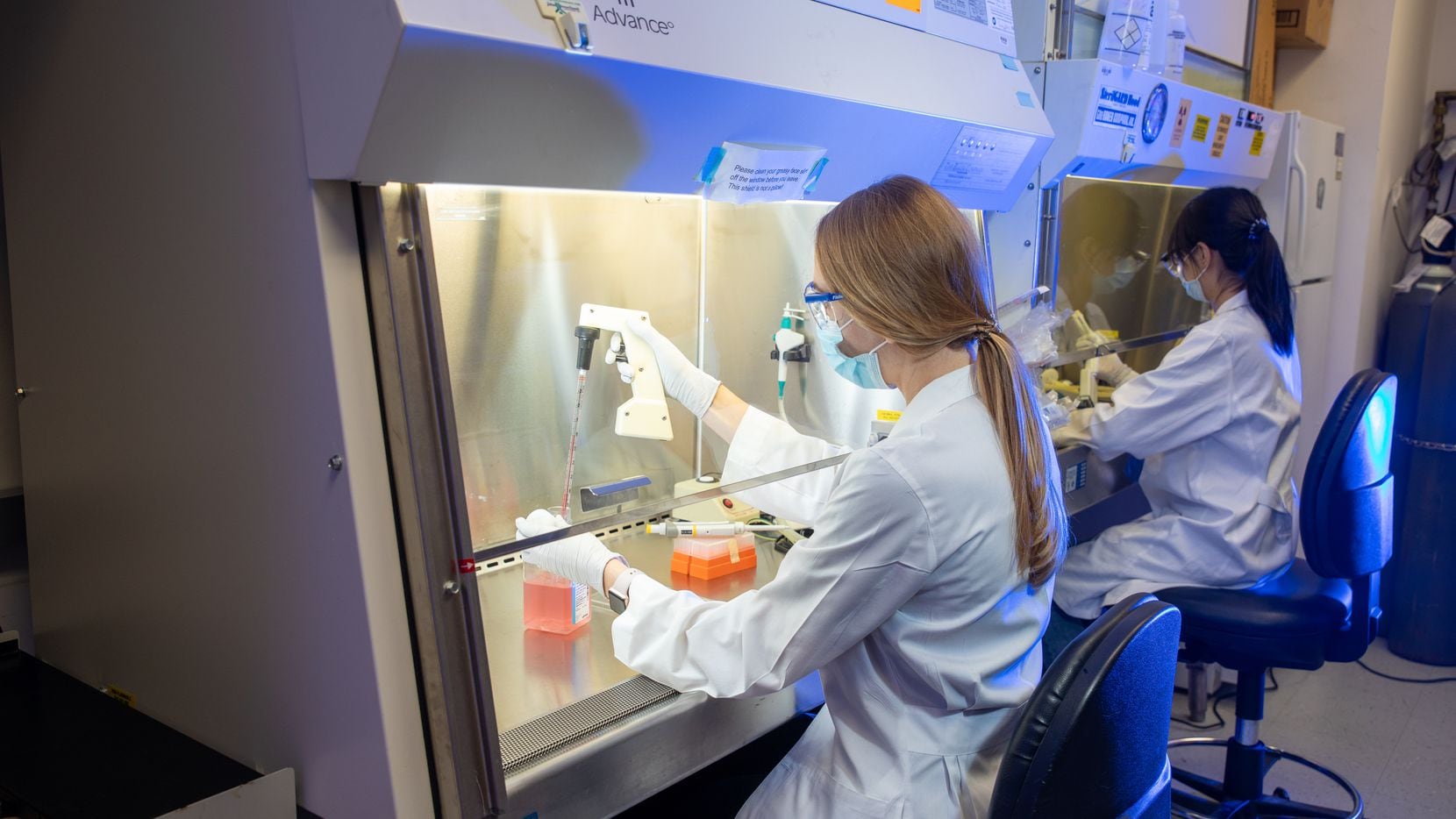 Workers in a lab at ReCode Therapeutics, a biopharma company that got its start in a research project at the University of Texas Southwestern. The company received its second $80 million investment in October 2021.
