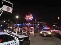 The increased police presence is readily seen as people check out the various Deep Ellum...