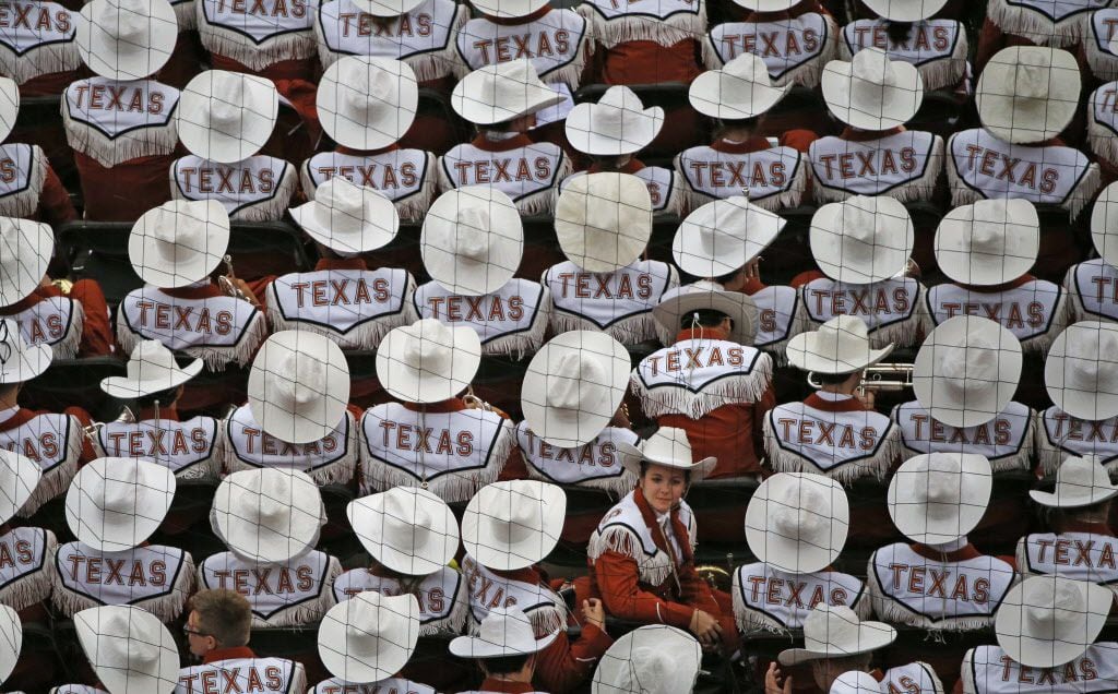 The Longhorn band watches the game from their seats in the end zone during the Oklahoma...
