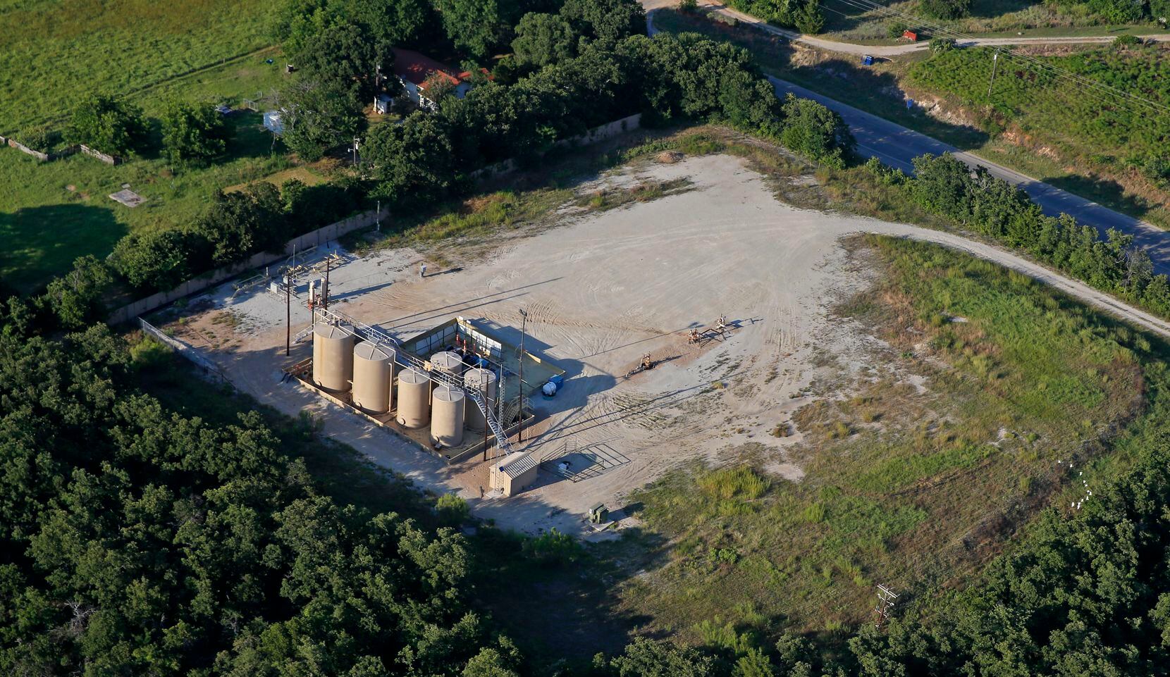 An aerial shot shows a wastewater disposal well site owned by EnerVest Operating in Azle in...