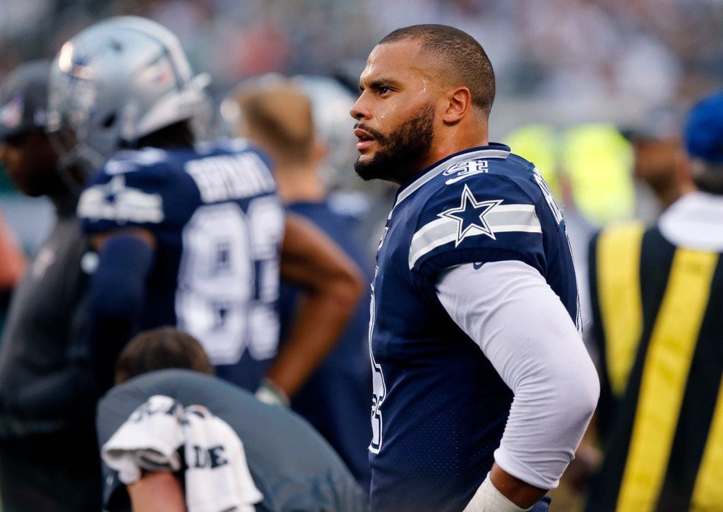 Dallas Cowboys quarterback Dak Prescott (4) is pictured on the sideline after not converting...