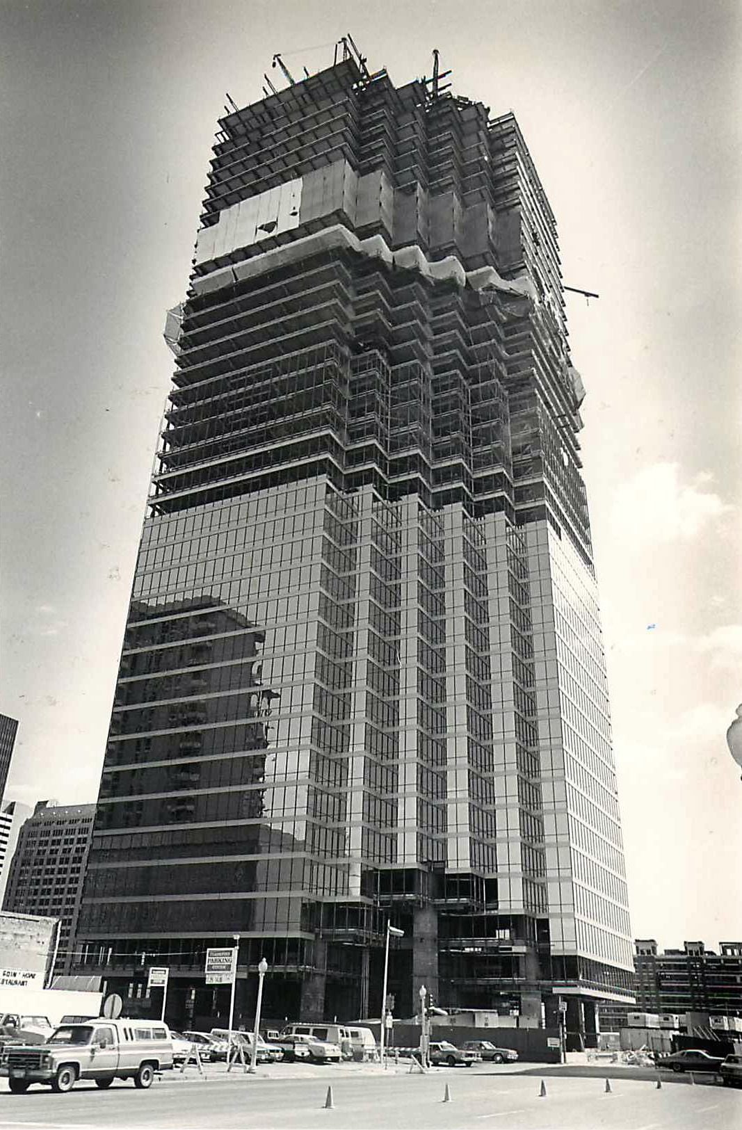 When downtown Dallas' tallest tower, Bank of America Plaza, was under construction in the...