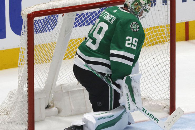 Dallas Stars goaltender Jake Oettinger (29) looks down at the ice after allowing an overtime...