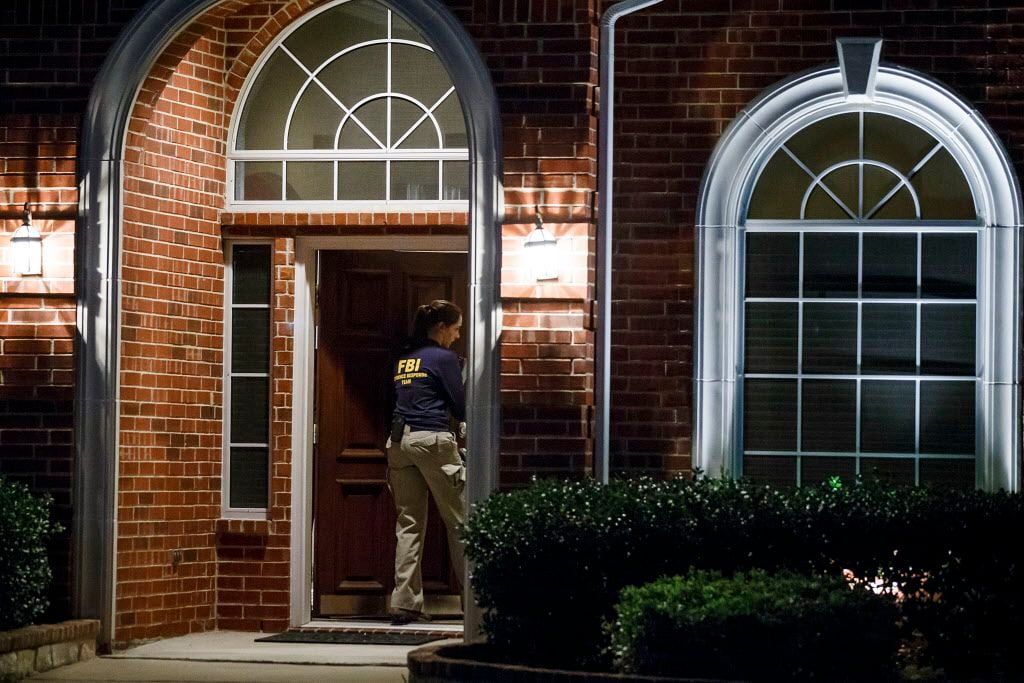 Members of an FBI evidence response team enter the family home of Sherin Mathews in the 9000...