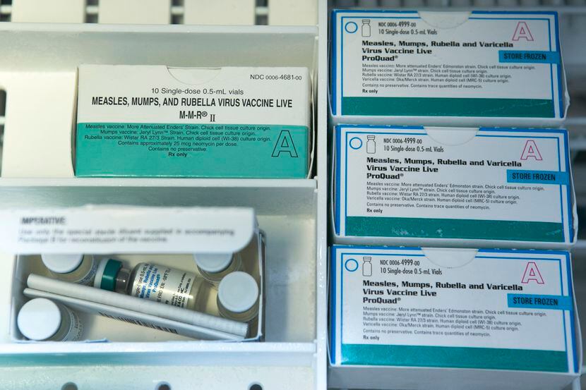 FILE - This Thursday, Jan. 29, 2015, file photo, shows boxes of the measles, mumps and...