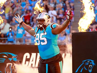 FILE - Panthers nose tackle Dontari Poe (95) is introduced before a preseason game against the New England Patriots in Charlotte, N.C., on Friday, Aug. 24, 2018. (Chris Keane/AP Images for Panini)