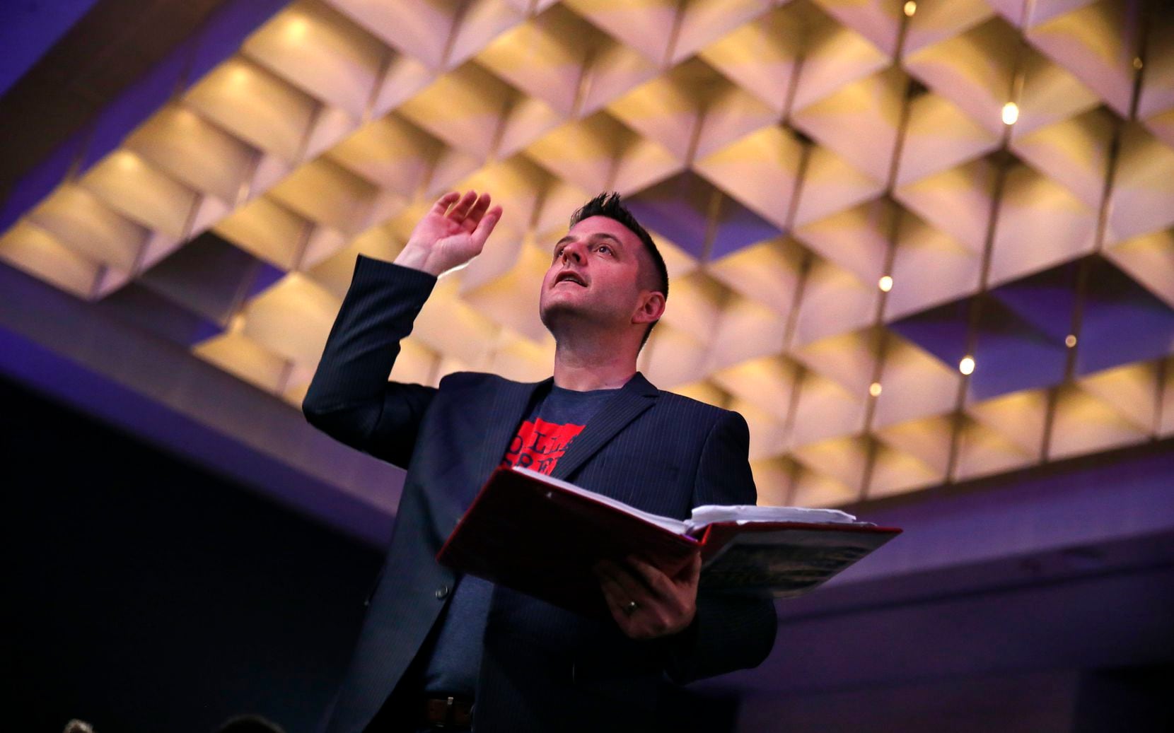 Director Jonathan Palant leads the Dallas Street Choir during the opening session of The Dallas Festival of Ideas at the Kay Bailey Hutchison Convention Center, Saturday, April 29, 2017.