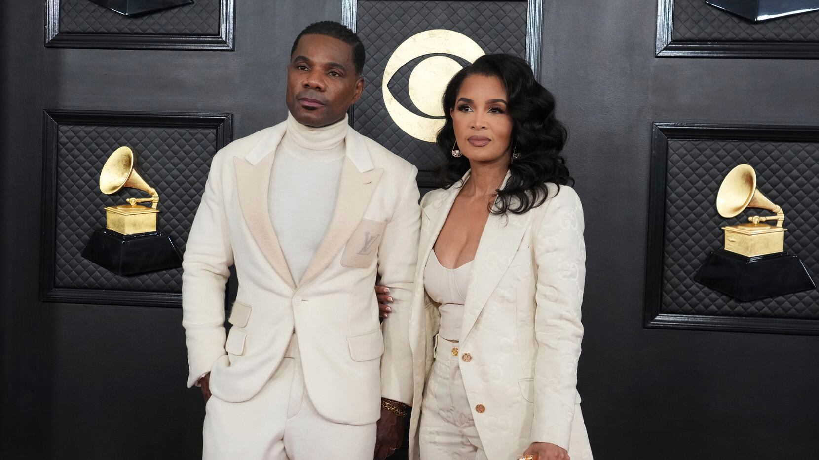 Kirk Franklin, left, and Tammy Collins arrive at the 65th annual Grammy Awards on Sunday,...