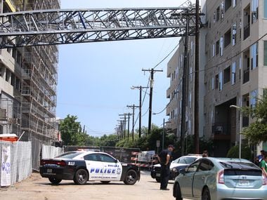 Officials responded after a crane collapsed into the Elan City Lights apartments in Dallas...