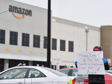 Amazon workers at Amazon's Staten Island warehouse strike in demand that the facility be shut down and cleaned after one staffer tested positive for the coronavirus on March 30, 2020 in New York.