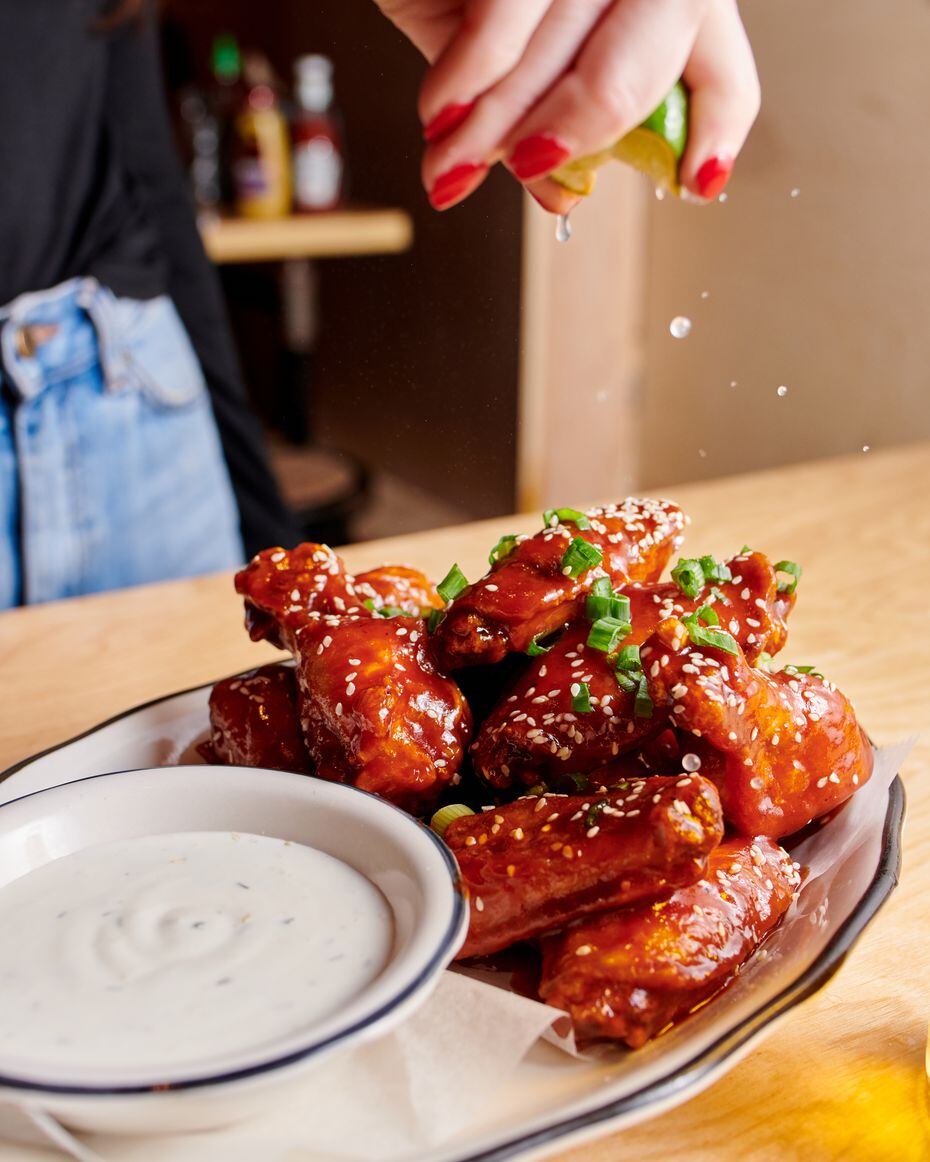 The spicy Korean wings at Black Tap Craft Burgers & Beer are one of co-owner Chris Barish's ...