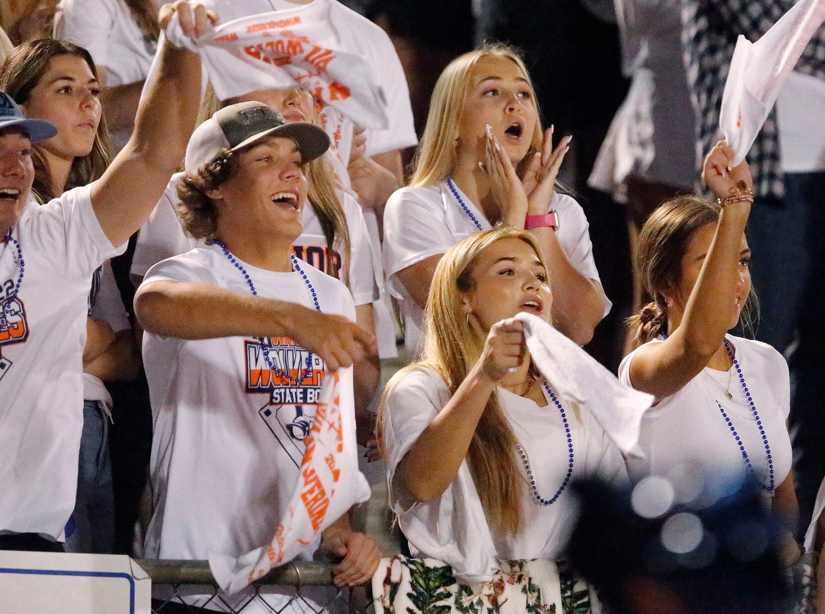 The Wakeland HIgh School student section cheers their team during the first half as Wakeland...