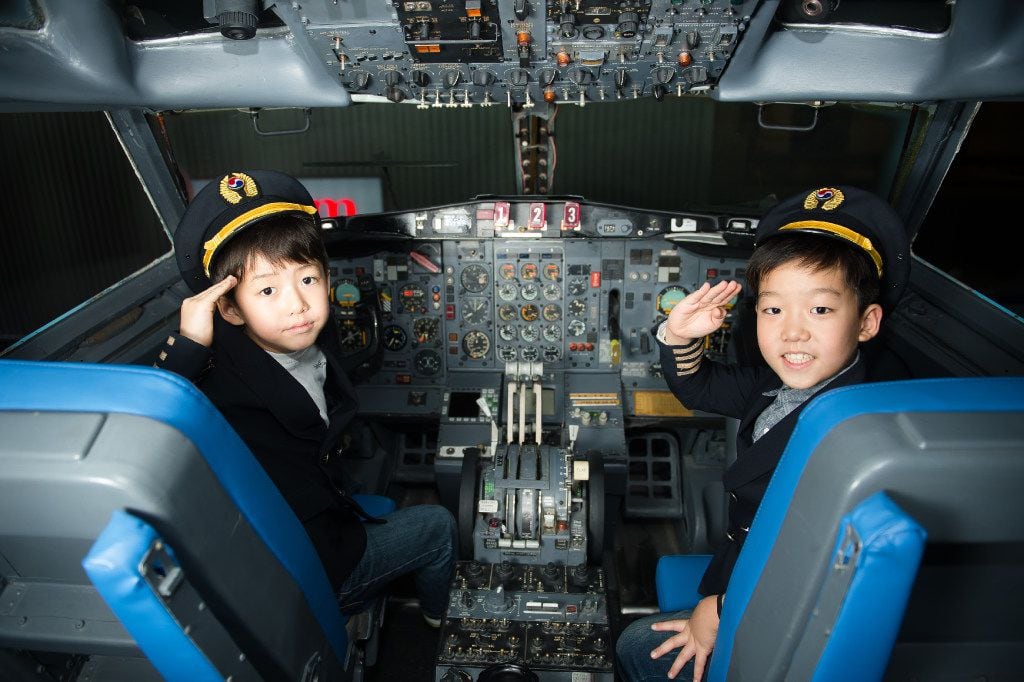 A promotional photo shows how kids can try their hand as a pilot in KidZania, an educatinal...