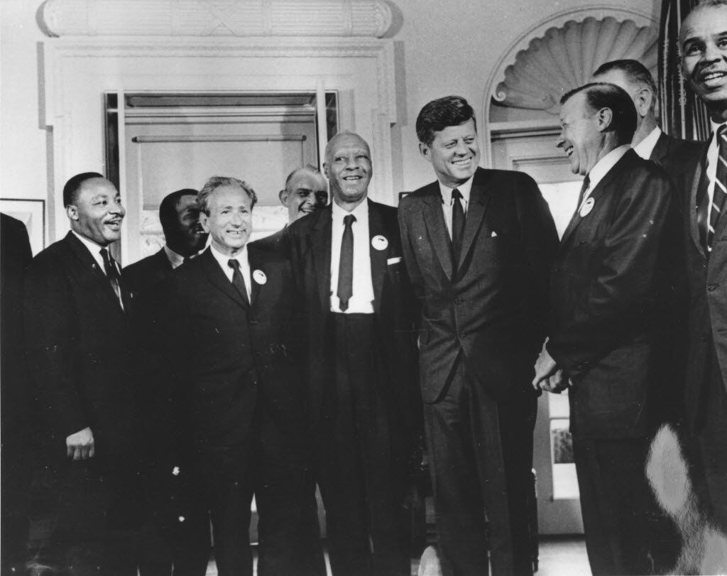 President John F. Kennedy met in the White House with leaders of the civil rights March on Washington on Aug. 28. 1963. From left:  Whitney Young,   Martin Luther King, Rabbi Joachim Prinz, A. Philip Randolph, President Kennedy, Walter Reuther and Roy Wilkins. Behind Reuther is Vice President Lyndon Johnson.