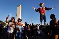 Crowds fill Big Tex Circle to take selfies with the larger-than-life cowboy and the Tower...