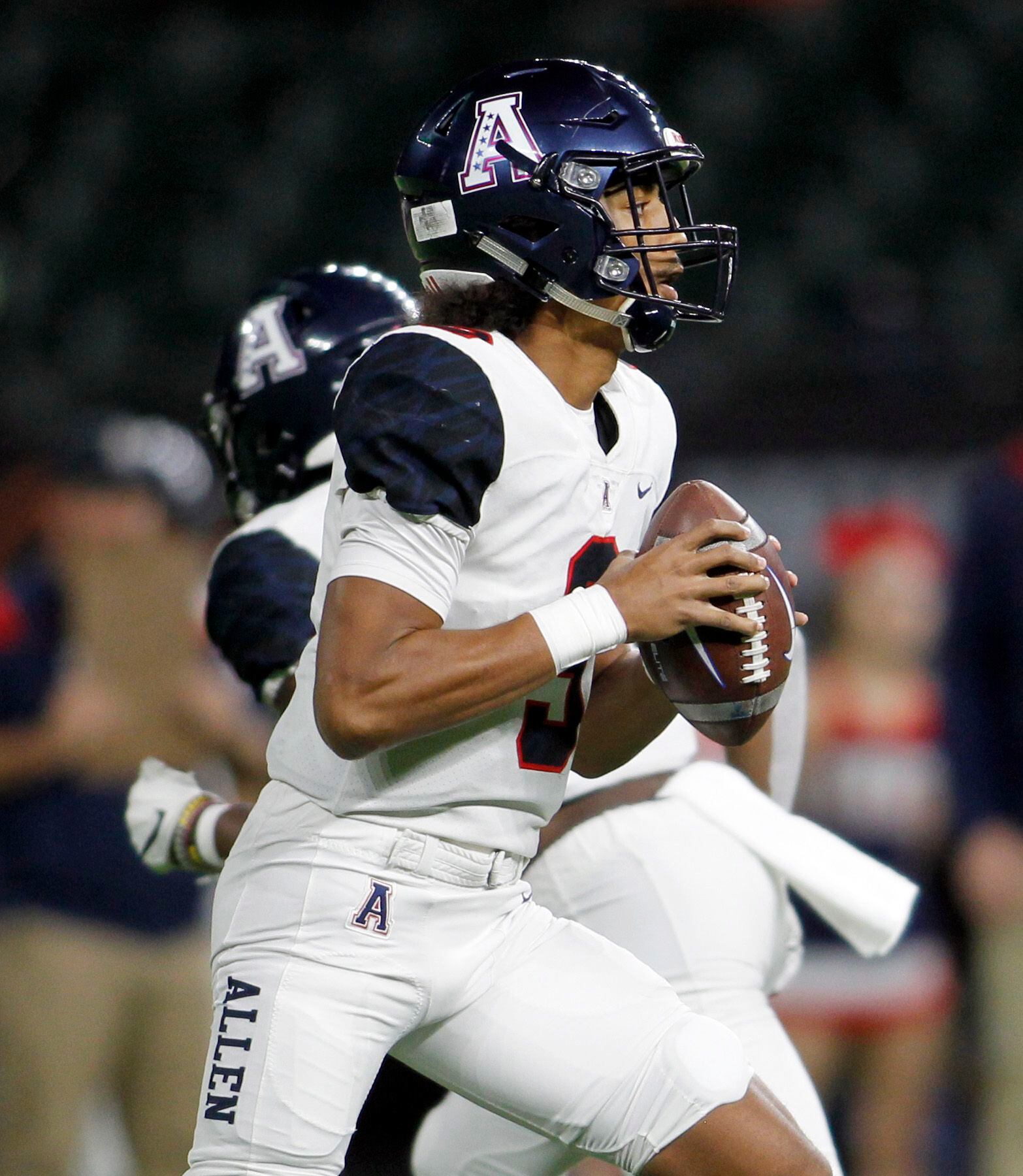 Allen quarterback Mike Hawkins (3) drops back to pass during 2nd quarter action against Lake...