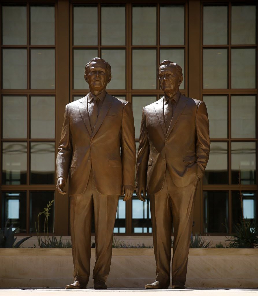 Sculptor Chas Fagan of Charlotte created the 8-foot bronze statues of former Presidents...