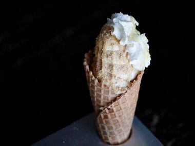 A High Tea cone, which includes soft serve, lemon curd, crushed tea biscuits and honey dust,...