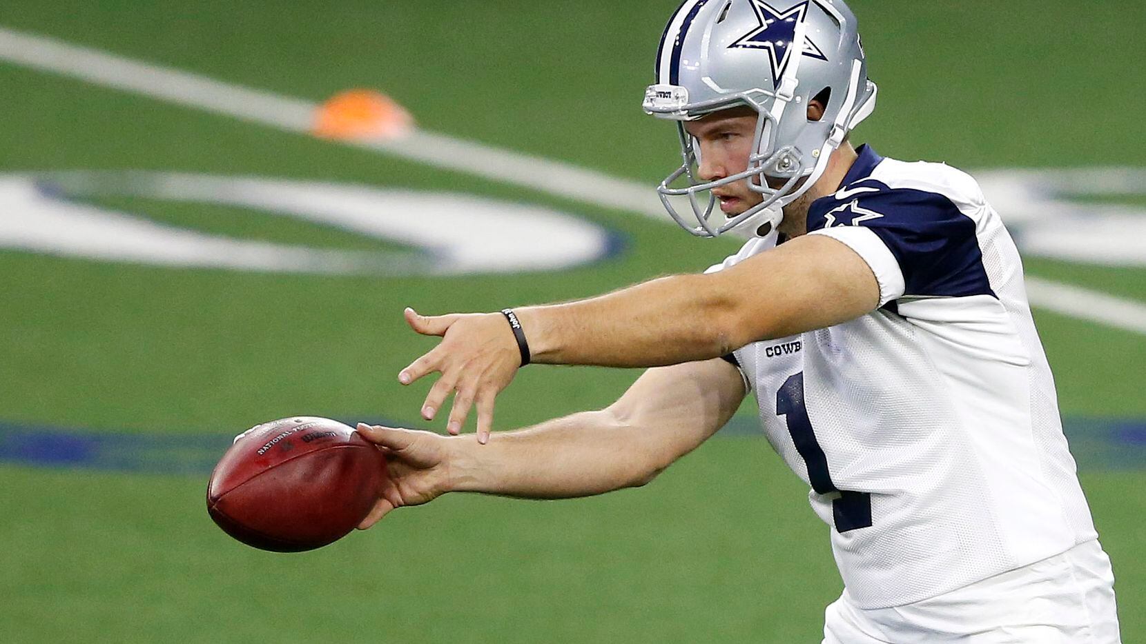 Dallas Cowboys punter Hunter Niswander (1) during practice at the Ford Center at The Star in...