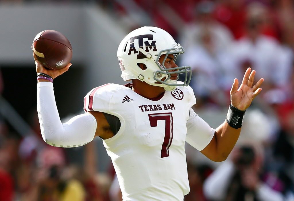 TUSCALOOSA, AL - OCTOBER 18:  Kenny Hill #7 of the Texas A&M Aggies looks to pass against...